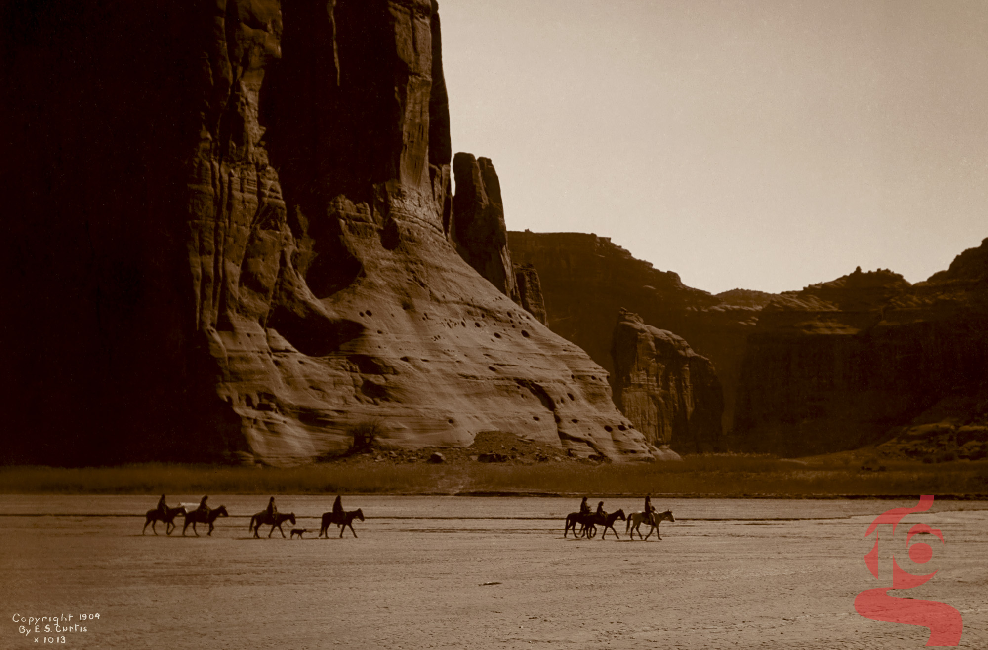 Sept cavaliers diné Navajo et un chien dans le Canyon de Chelly en Arizona, photographiés par Edward S. Curtis en 1904